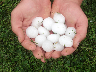 assorted white stones on person palm thumbnail