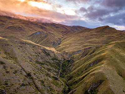 canyon under cloudy sky thumbnail