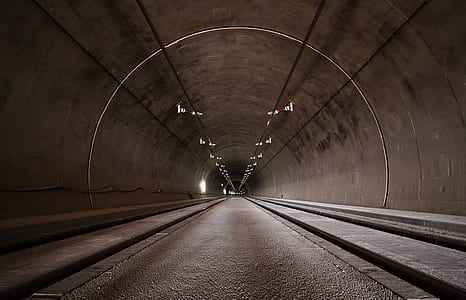 shallow focus photography of brown tunnel thumbnail