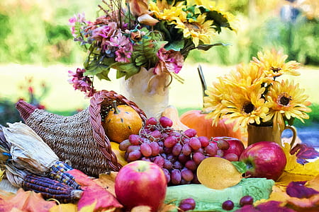 variety of fruits and flowers at daytime thumbnail