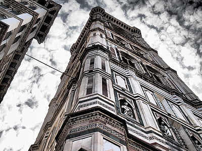 worm view of gray and black concrete building thumbnail