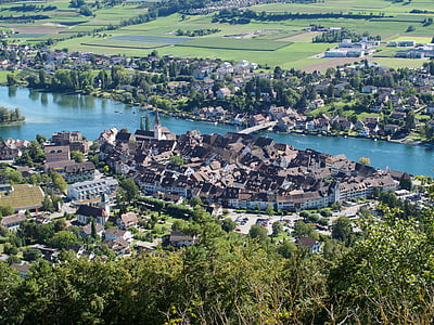 aerial photography of city beside river at daytime thumbnail