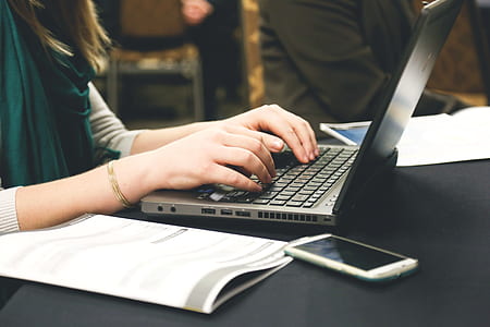 woman typing on black laptop thumbnail