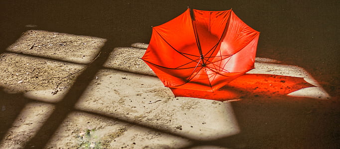 red umbrella taken at daytime thumbnail