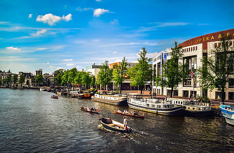 boat near dock during white and blue sky thumbnail