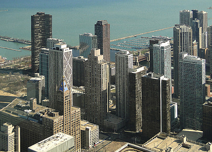 aerial photography of gray concrete buildings thumbnail