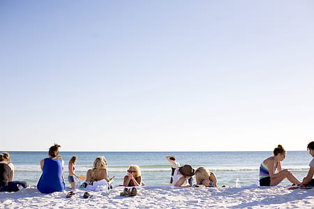 group of people on the seashore thumbnail