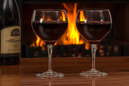 two clear long-stemmed drinking glasses thumbnail