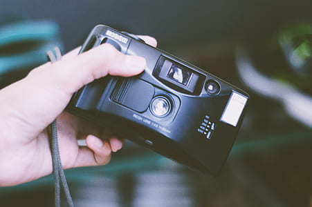 black point-and-shoot camera thumbnail
