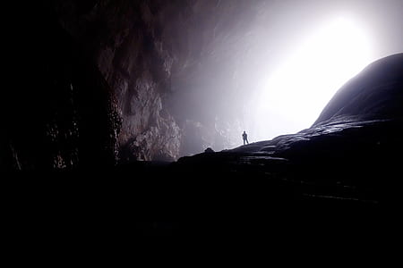 silhouette of person in cave thumbnail