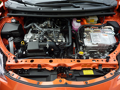car engine bay of orange car thumbnail