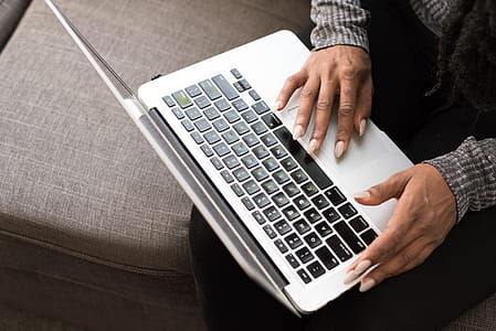 Person Using Silver Macbook thumbnail