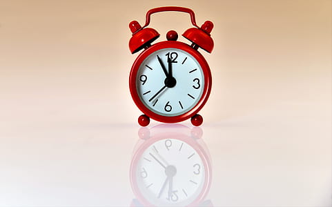 red alarm clock at 11:55 thumbnail