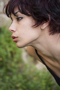 selective focus photographed of woman wearing black top thumbnail