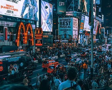 crowd of people walking in New York Time Square thumbnail
