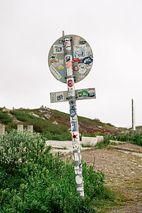 Road sign with stickers thumbnail