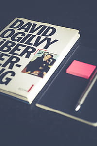 David Ogilvy Book Lying Beside Black Leather Booklet thumbnail