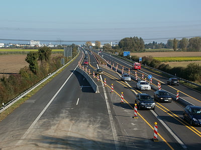 cars running on asphalt road thumbnail