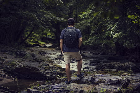 man wearing backpack thumbnail