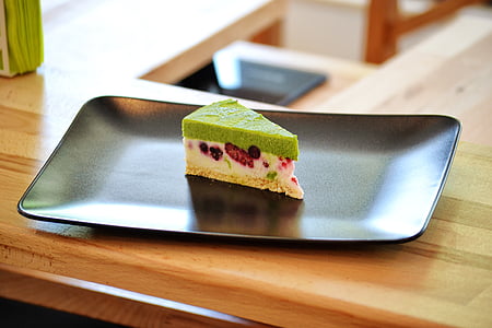 slice of cake on rectangular black plate thumbnail