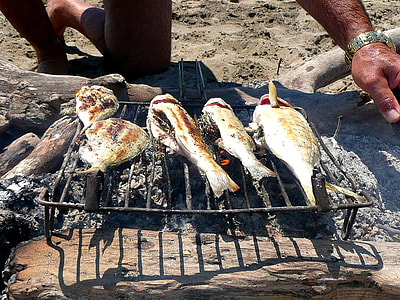 person grilling fish thumbnail