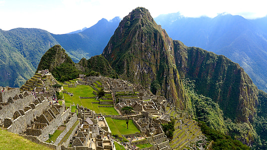 brown and gray mountain with concrete buildings thumbnail