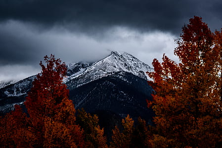 gray mountain under cloudy sky thumbnail