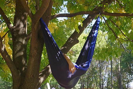 person lying on hammock thumbnail