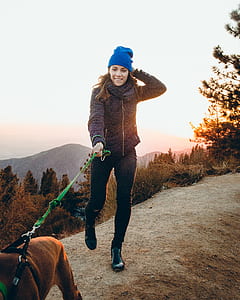 woman walking with dog thumbnail
