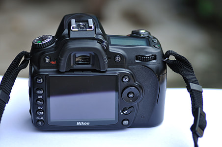 black Nikon DSLR camera thumbnail