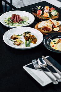 sushi beside flatbread and soup thumbnail