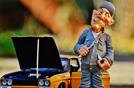 man fixing car toy set thumbnail
