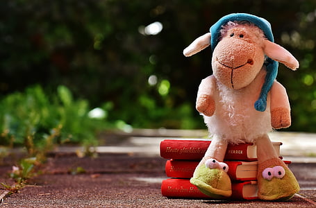 lamp plush toy on books thumbnail