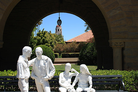four person statue on park thumbnail