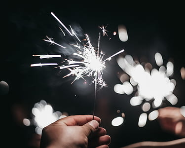 selective focus photography of sparkler thumbnail