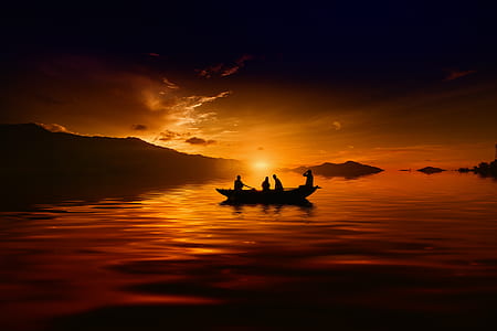four people riding on boat during golden hour thumbnail