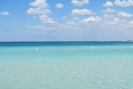 warm body of water during daytime thumbnail