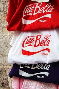 four assorted-color Coca-Cola shirts thumbnail