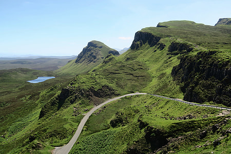 green mountain and road during daytime thumbnail