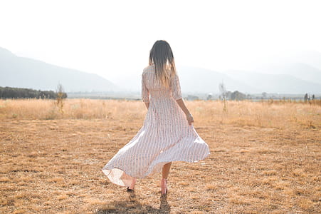 woman standing on the hill thumbnail