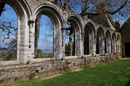 gray and brown concrete structure beside green grass at daytime thumbnail