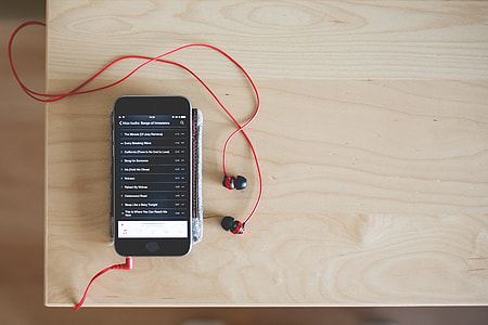 Playing Music with Red Earphones thumbnail