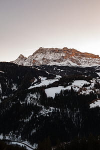 snow-capped mountain under sky thumbnail