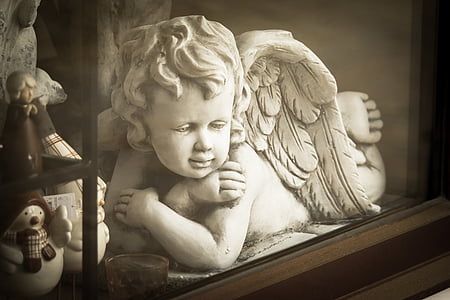 white cherub figurine thumbnail