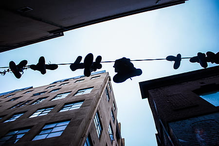 silhouette photo of a footwear lot thumbnail