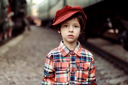 boy wearing red hat thumbnail