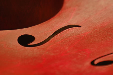 closeup photo of music notes against red background thumbnail