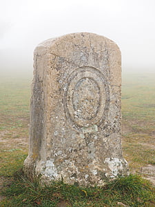 brown graveyard on grass field thumbnail