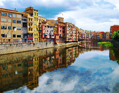 body of water surrounded by buildings thumbnail
