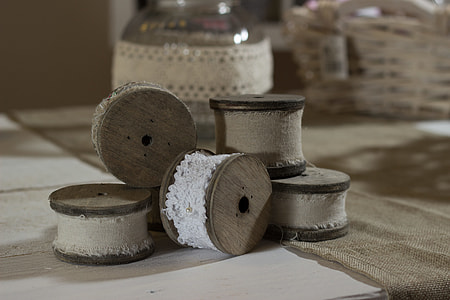 white laces on white wooden table thumbnail